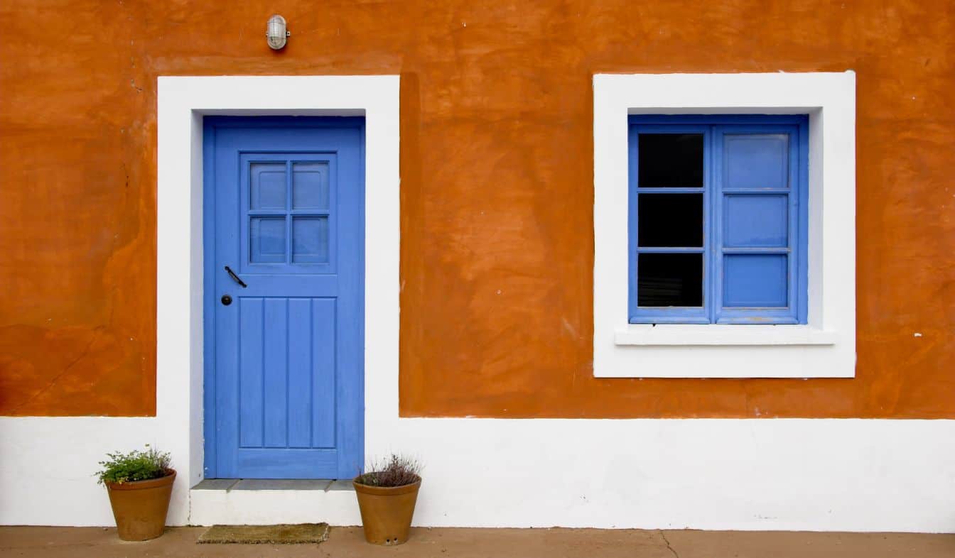Interior vs Exterior Paint: Which Is Best for Long-Lasting Results? blue window anddoor 2025