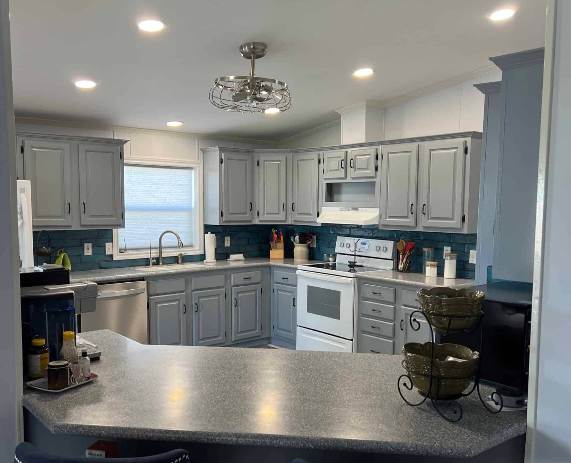 The same kitchen after Armored Painting refinished the cabinets