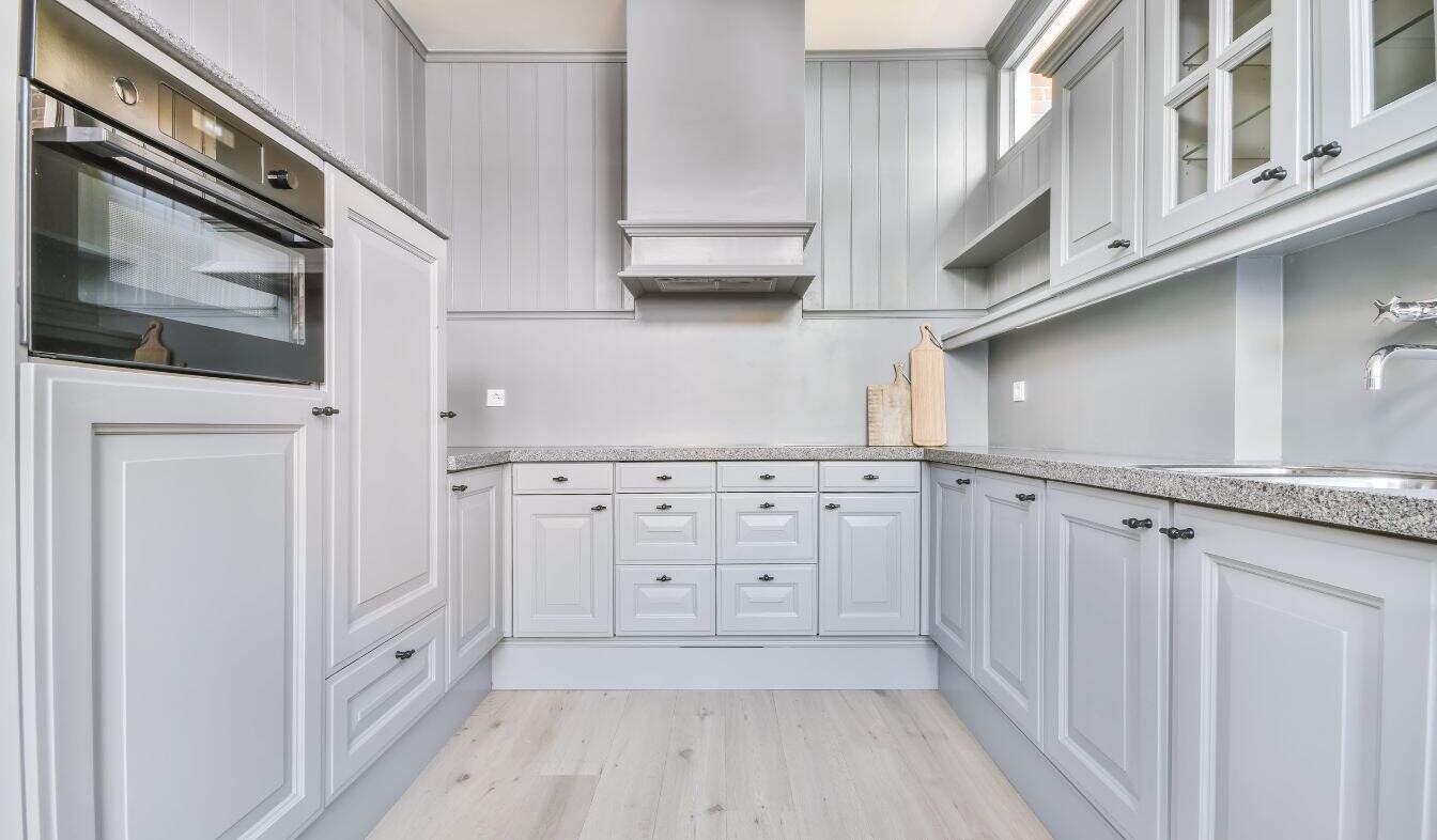 When Should You Consider Cabinet Refinishing 3 a-luxury-kitchen-island-2025